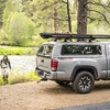 image:imageYakima Rooftop Fly Rod Carrier Adjustable Length Holder for up to 4 Fly Fishing Poles up to 10 Ft Long  Felt Padding Reel Box amp Tubes for Secure Gear Storage DoubleHaul